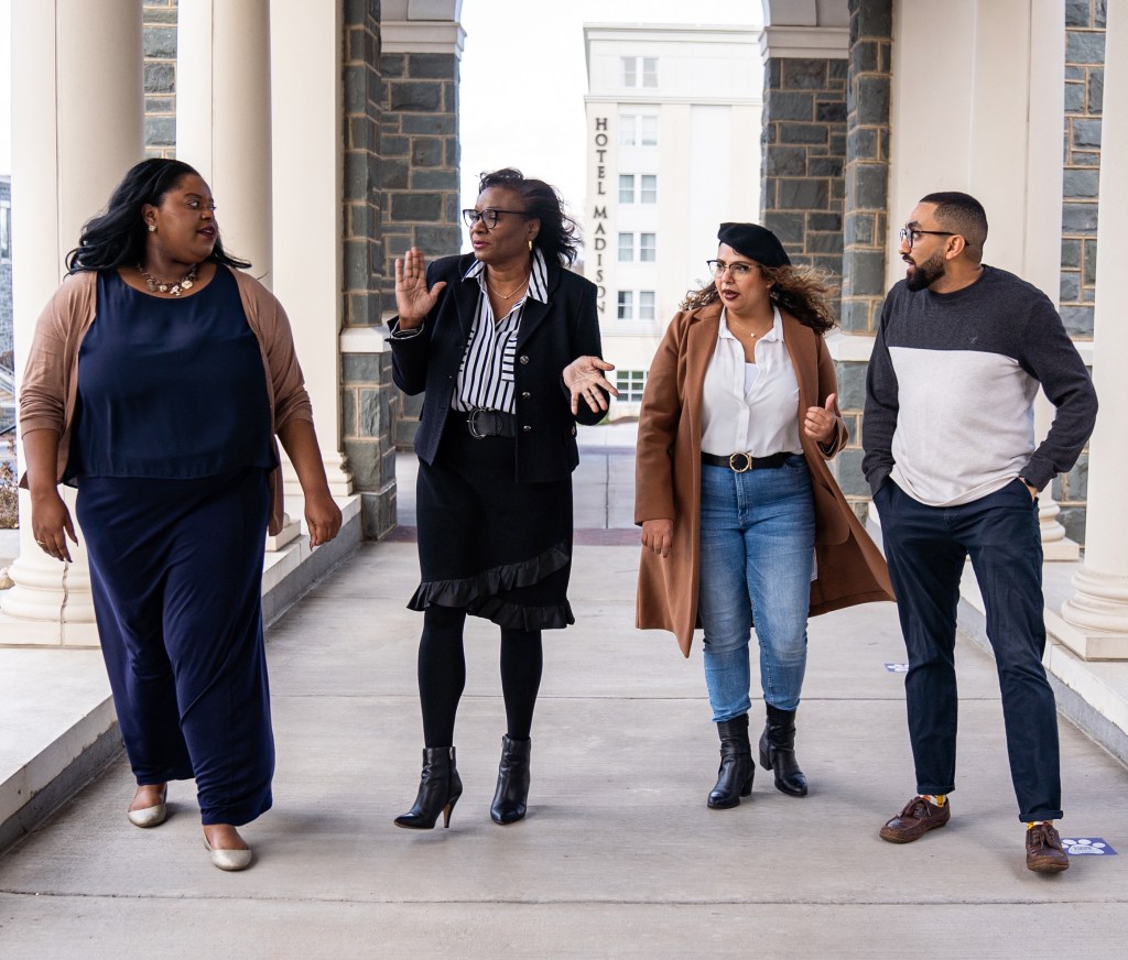 Dr. Linda M. Thomas with graduate students Olivia Rominiyi, Thomas Abir Maryan, and Mohamed Serry